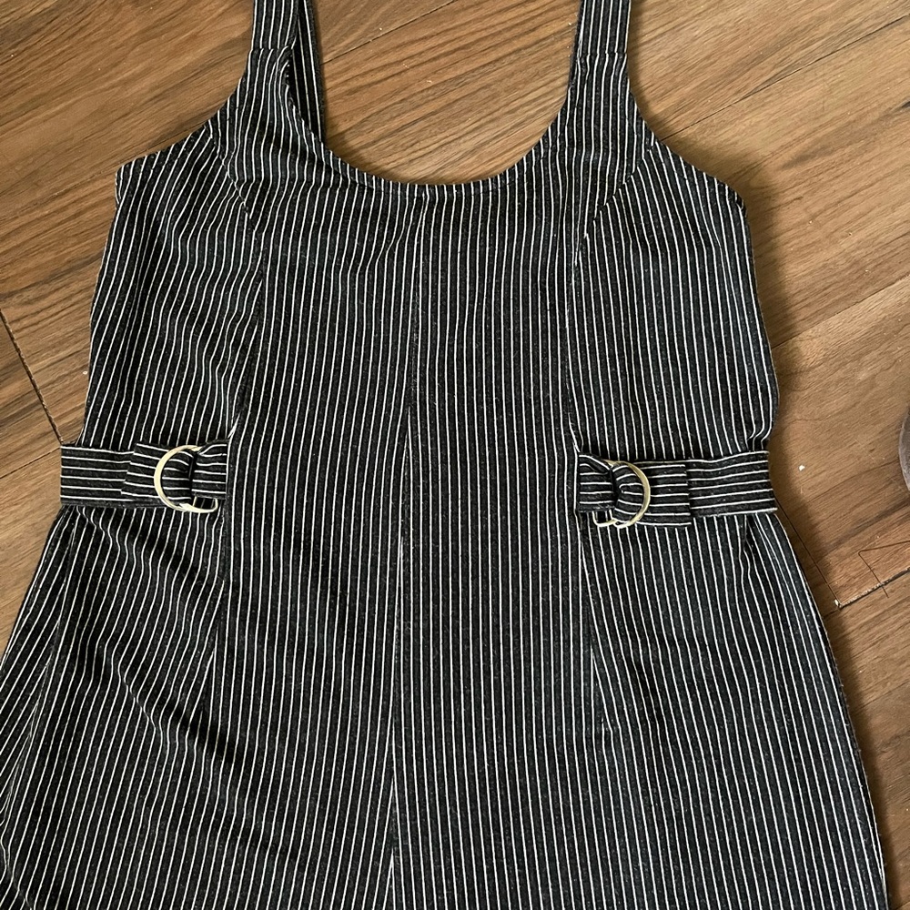 Striped Black and White jumpsuit with side Belts Detail